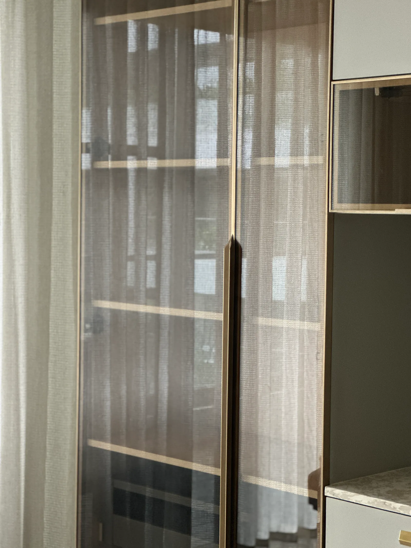 Tall glass-front crockery cabinet — Seema Katta Crockery